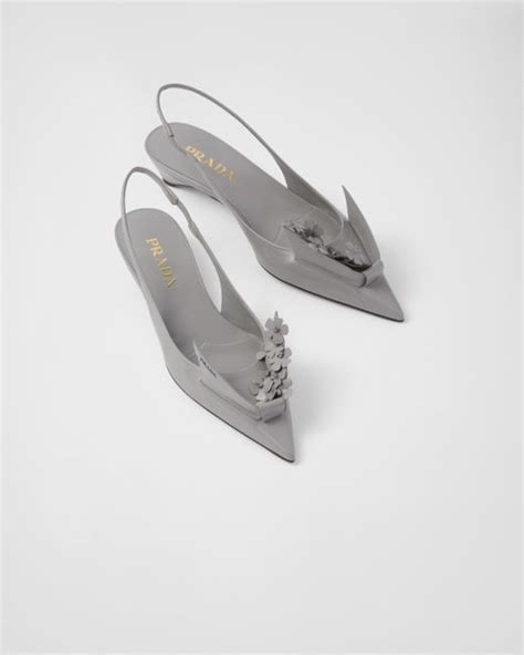 prada brushed leather slingback pumps with floral appliques|Prada buckle sculpted heel pump.